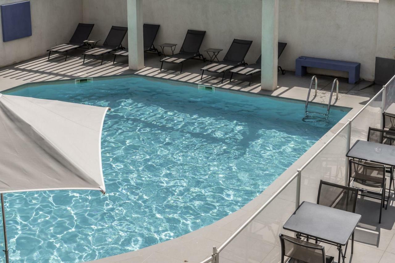 Hotel Le Bleu Marine Сент-Мари-де-ла-Мер Экстерьер фото