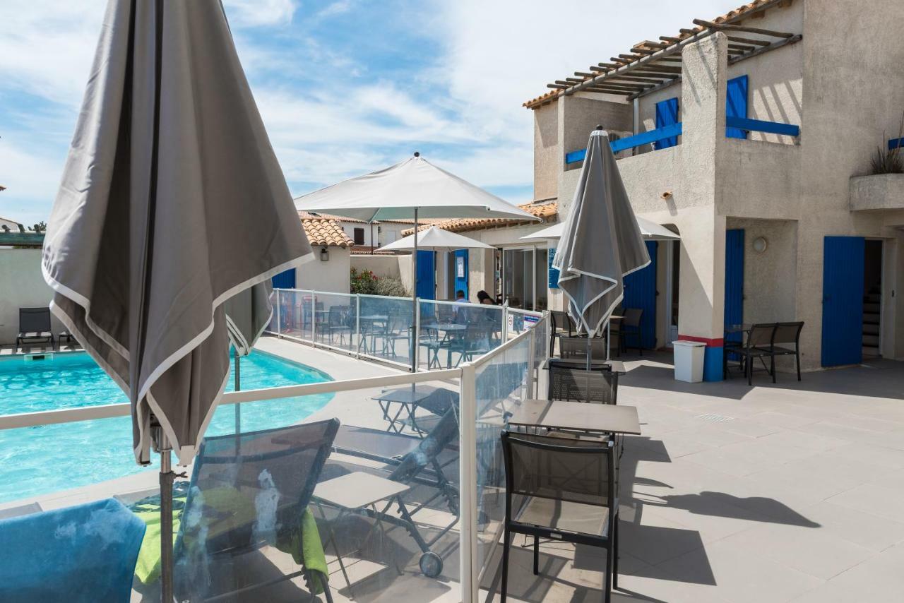 Hotel Le Bleu Marine Сент-Мари-де-ла-Мер Экстерьер фото