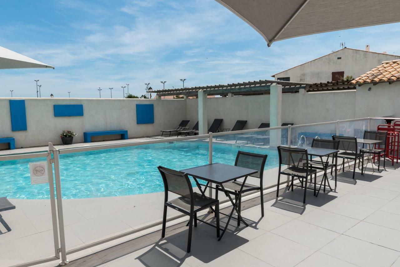 Hotel Le Bleu Marine Сент-Мари-де-ла-Мер Экстерьер фото