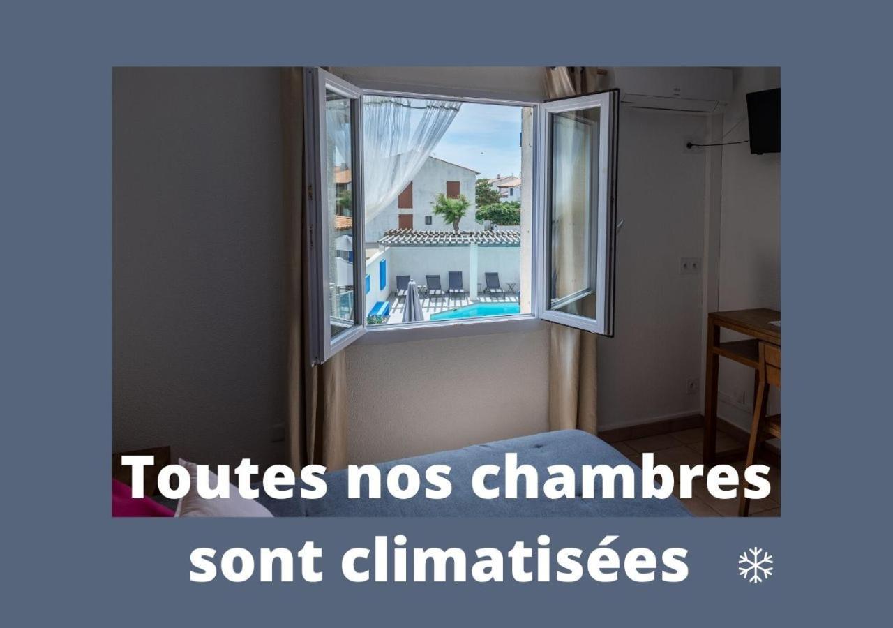 Hotel Le Bleu Marine Сент-Мари-де-ла-Мер Экстерьер фото